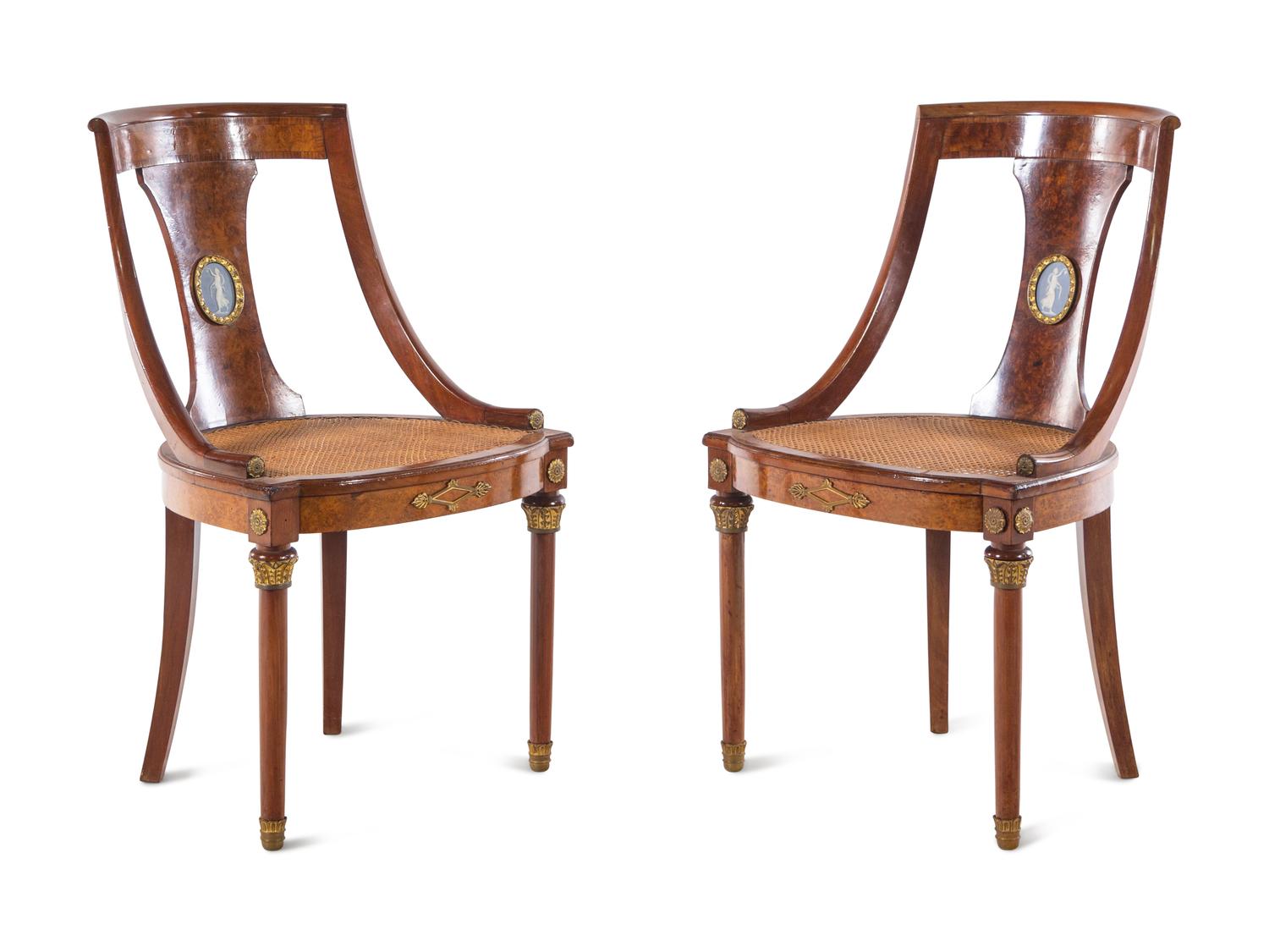 A French Gilt Bronze and Jasperware Mounted Burlwood Dining Suite