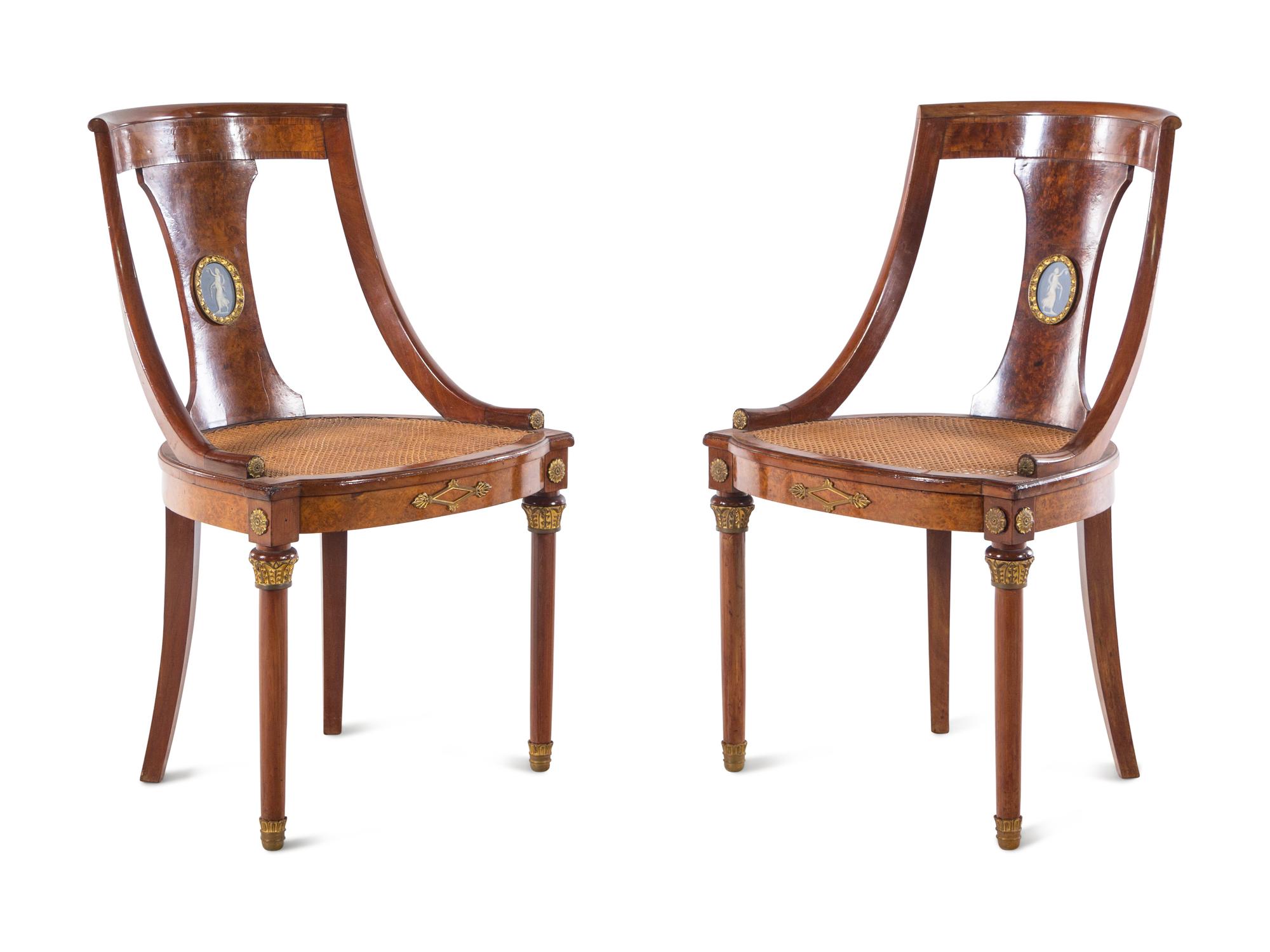 A French Gilt Bronze and Jasperware Mounted Burlwood Dining Suite