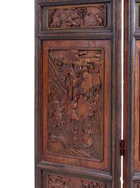 A Chinese Carved Hardwood Four-Panel Floor Screen