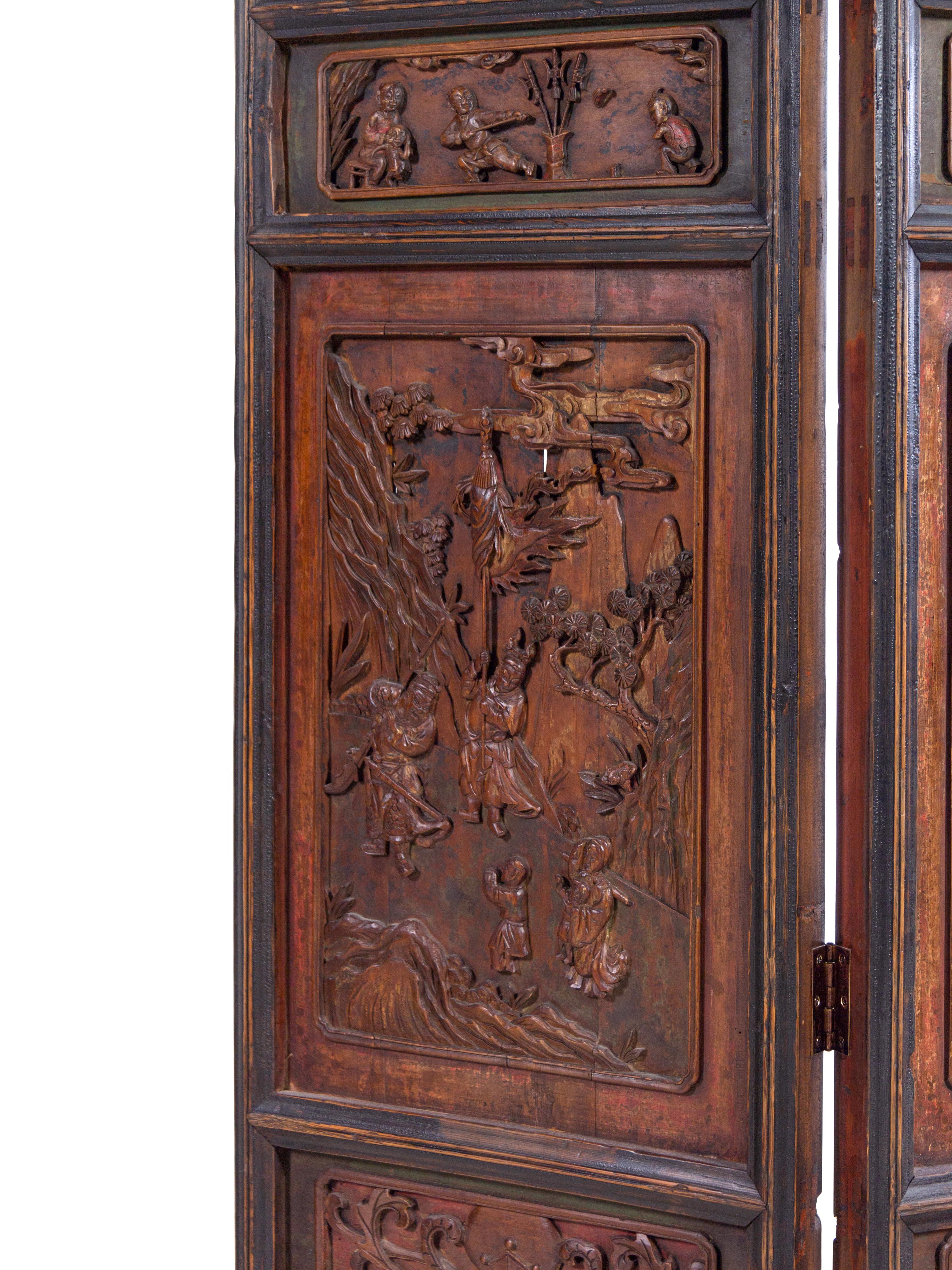 A Chinese Carved Hardwood Four-Panel Floor Screen
