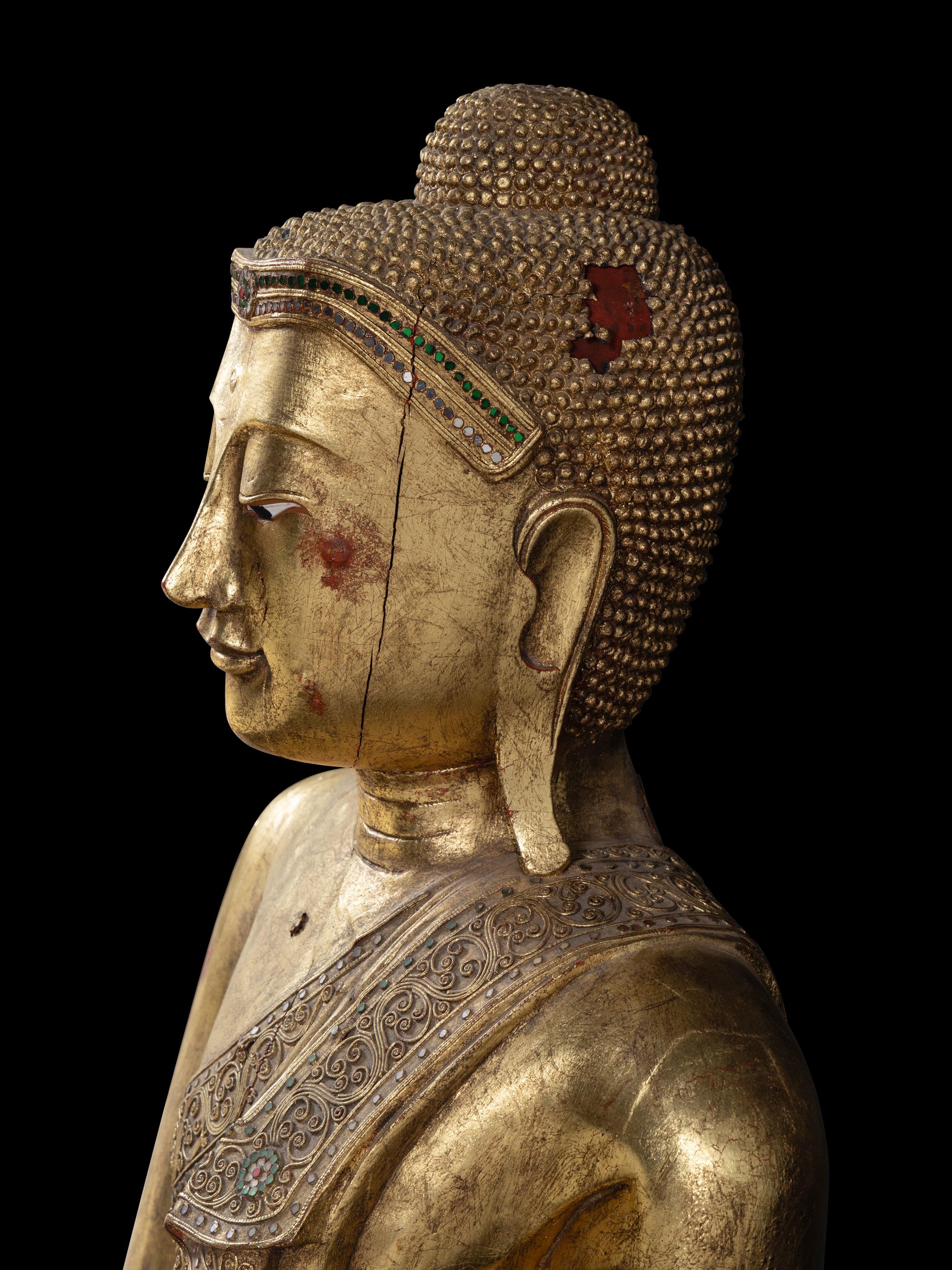 A Large Burmese Gilt Lacquered Figure of Buddha