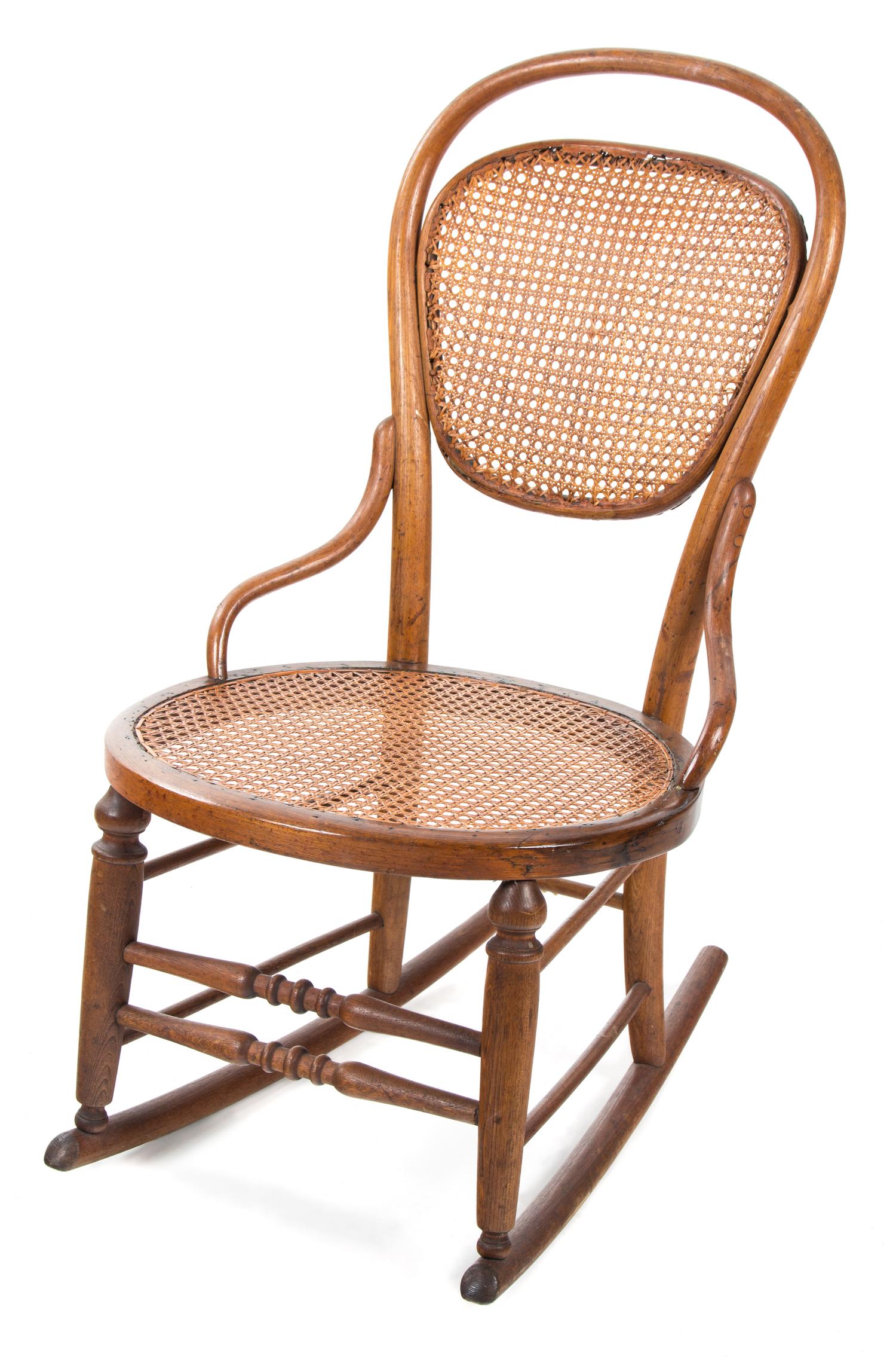A Diminutive Bentwood Rocking Chair Height 32 inches.