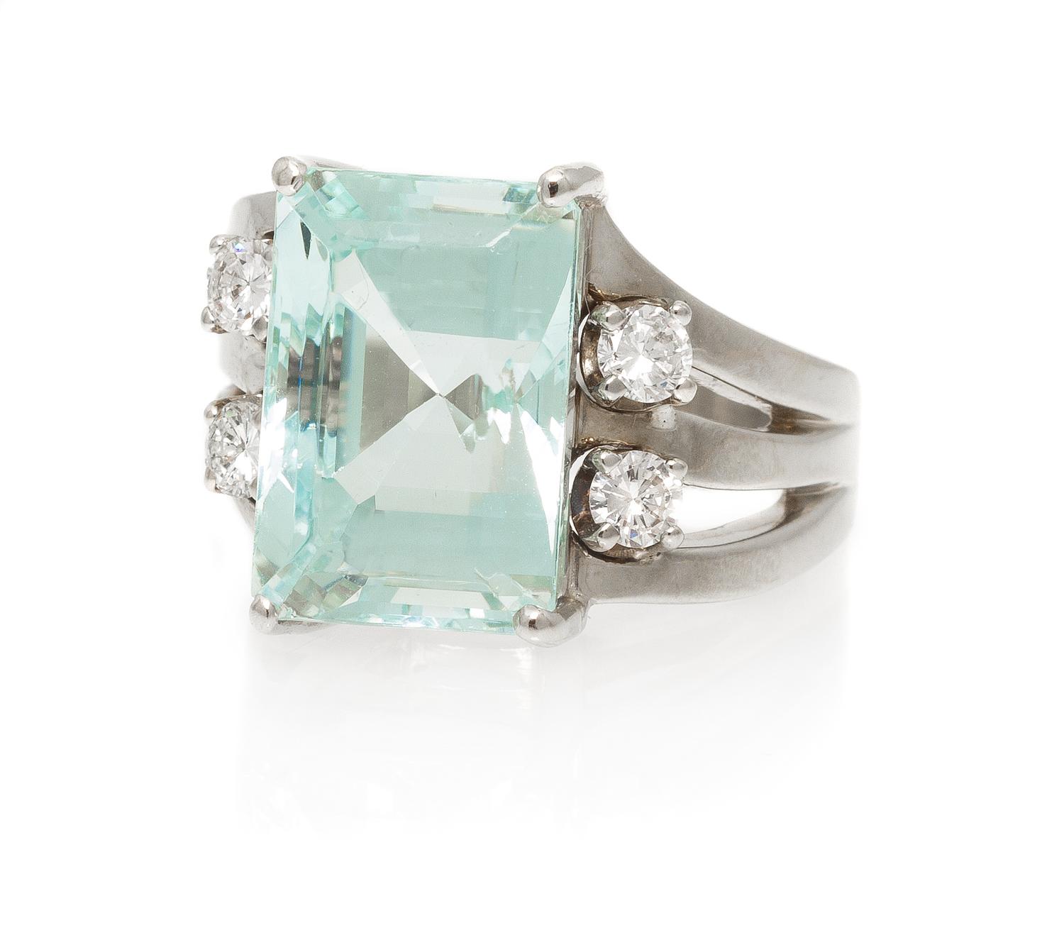 A 14 Karat White Gold, Aquamarine and Diamond Ring, 9.30 dwts.
