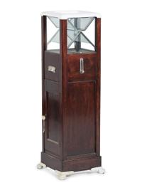 An Enameled Metal Mounted Walnut Floor Model Ticket Shredder