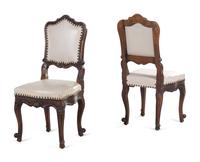 A Set of Ten Louis XV Provincial Oak Dining Chairs