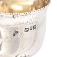 A Set of Four English Silver Trefoil Salt Cellars and a Silver Toast Rack