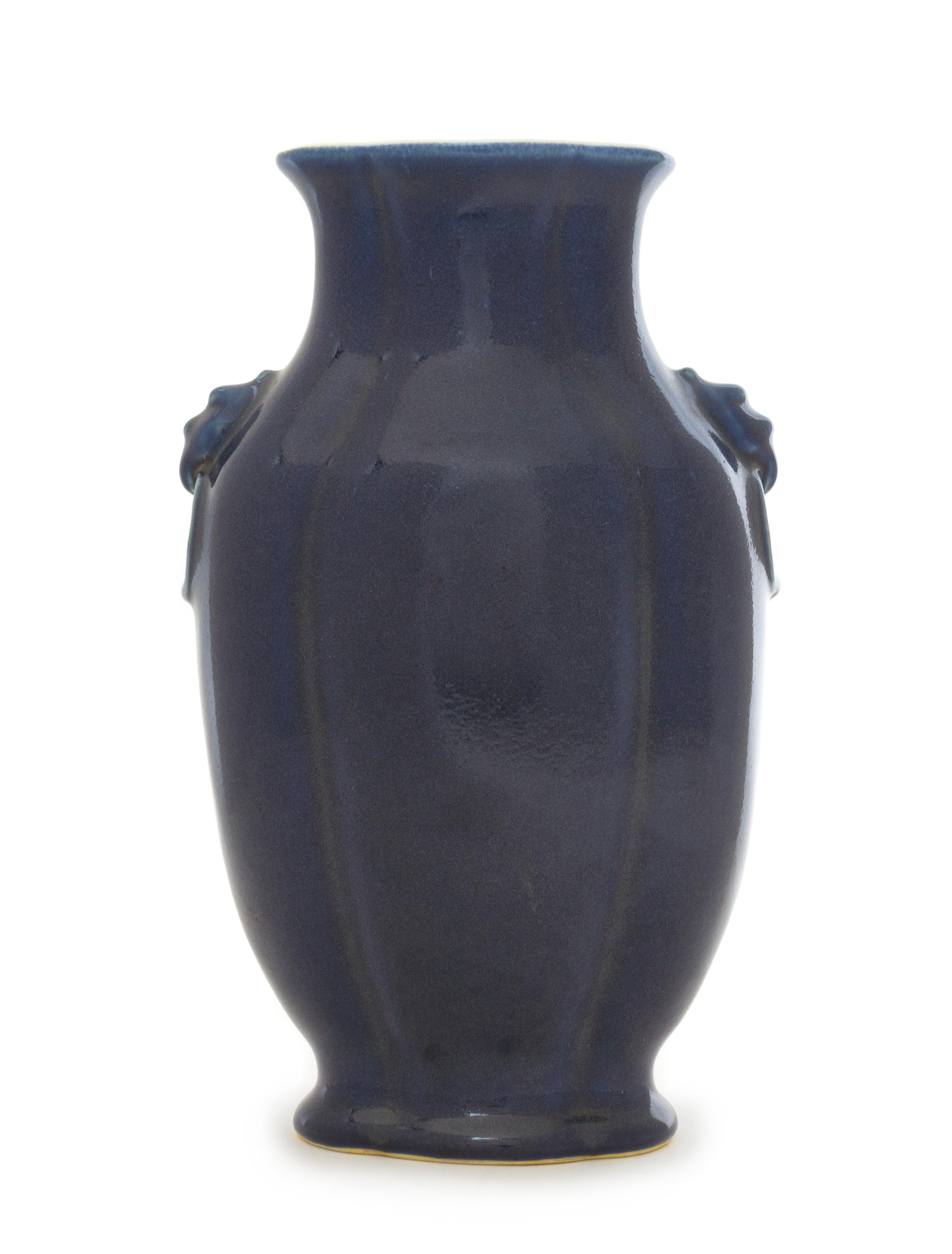 A Blue Glazed Porcelain Baluster Vase Height 10 3/4 inches.