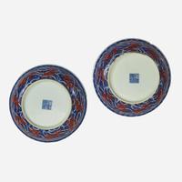 An associated pair of iron-red and underglaze blue "Dragon" Dishes 礬红青花龙纹盘子 或为一对 Qianlong six-character seal mark and of the period ????? ? ??