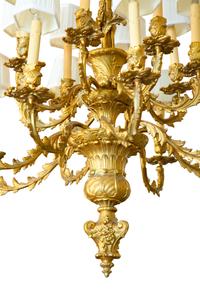 A Louis XV Style Gilt Bronze Sixteen-Light Chandelier