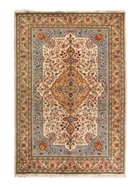 A Tabriz Wool Rug