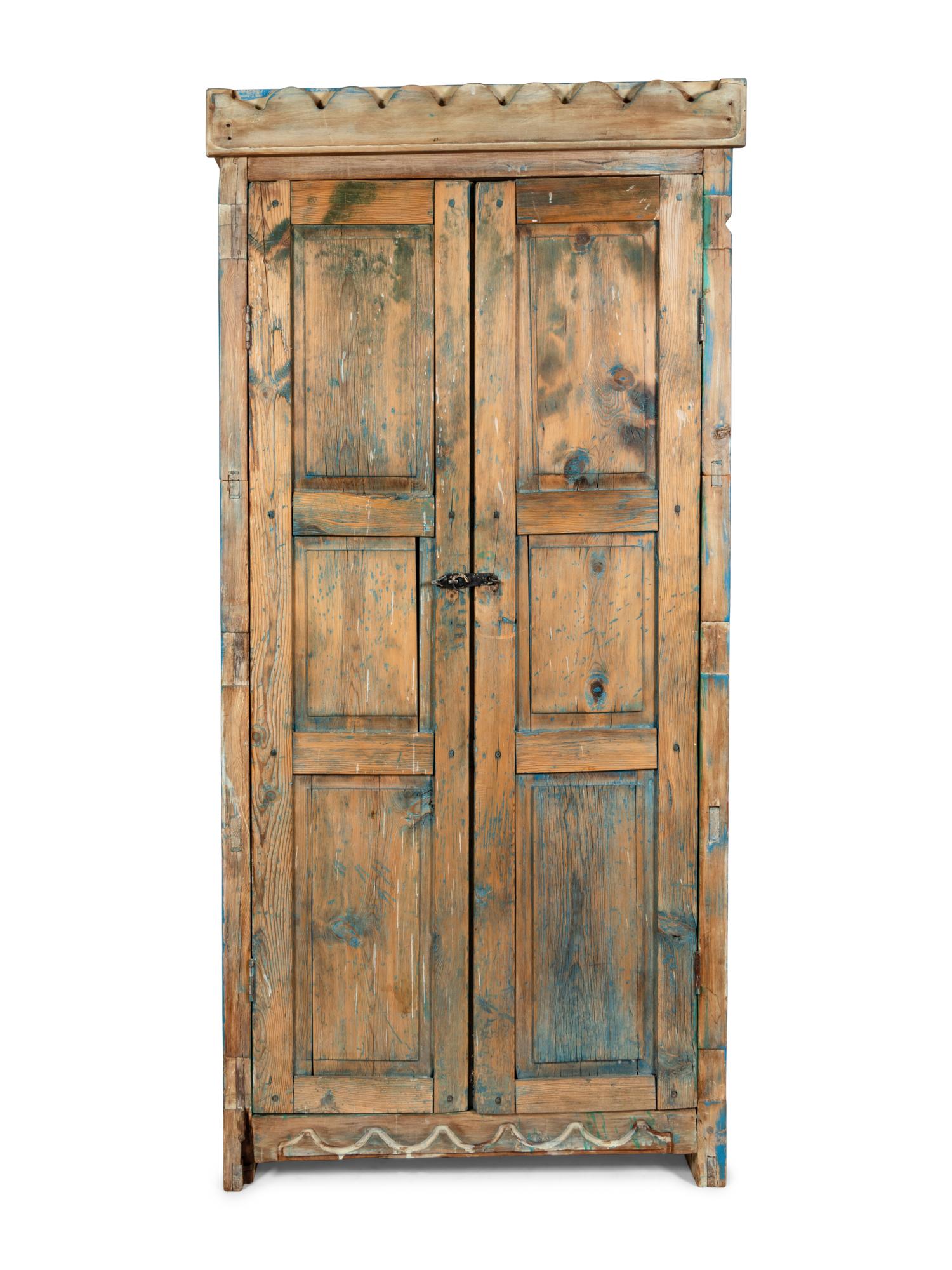 A Painted Rustic Cabinet in Two Pieces