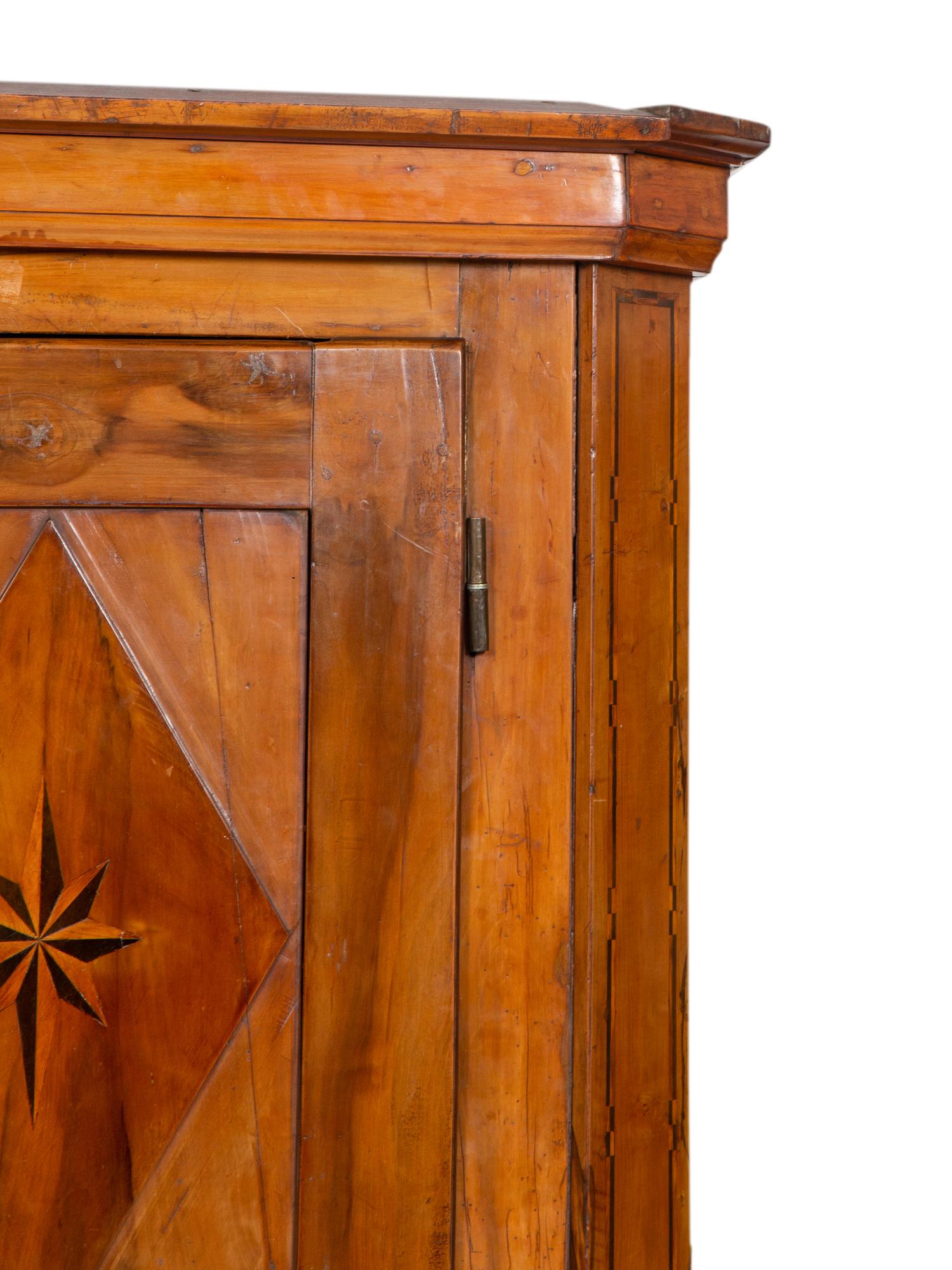 A Continental Olivewood Armoire