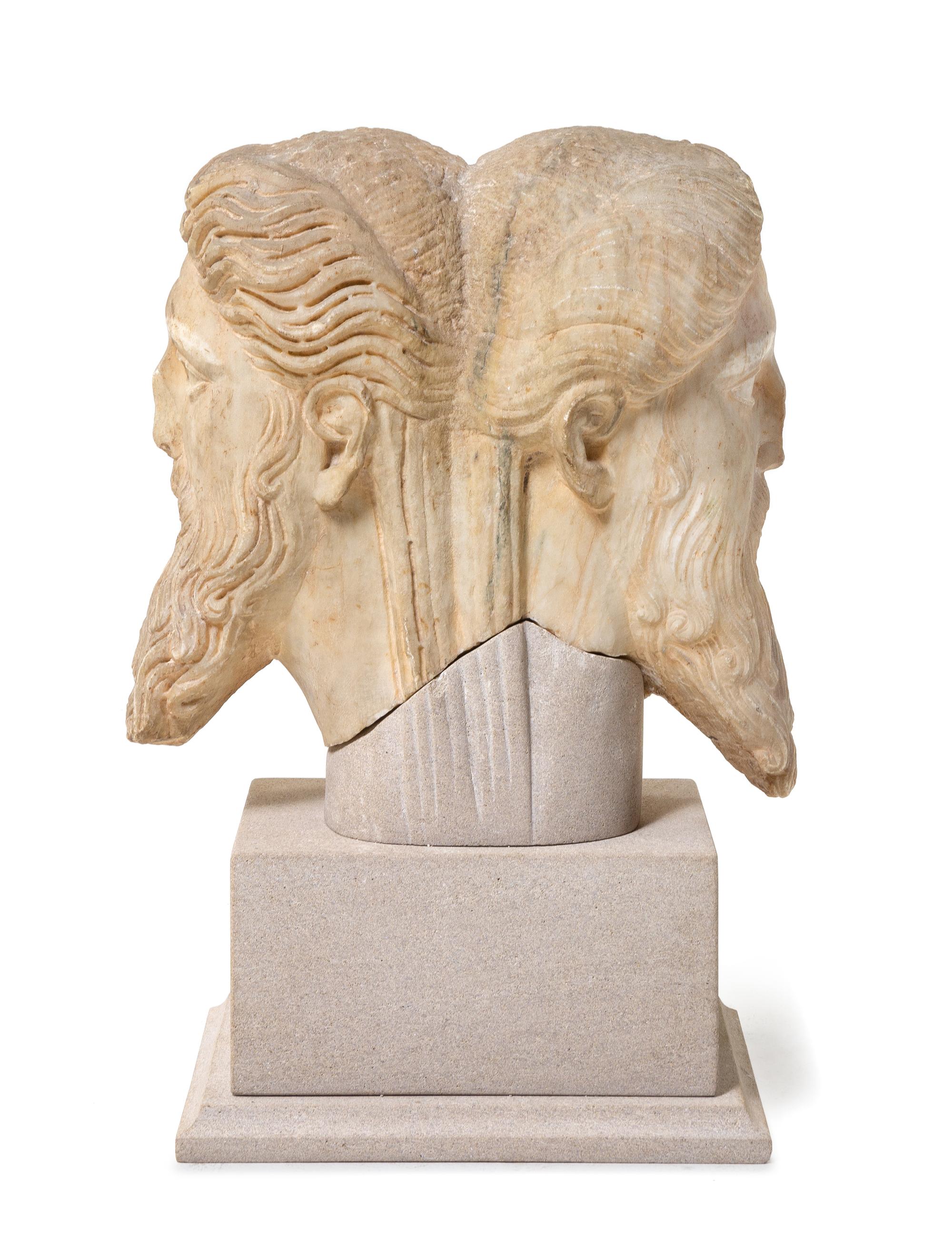 A Roman Marble Janiform Herm Head Height 13 1/2 inches. — CIRCA LATE 1ST-EARLY 2ND CENTURY C.E.