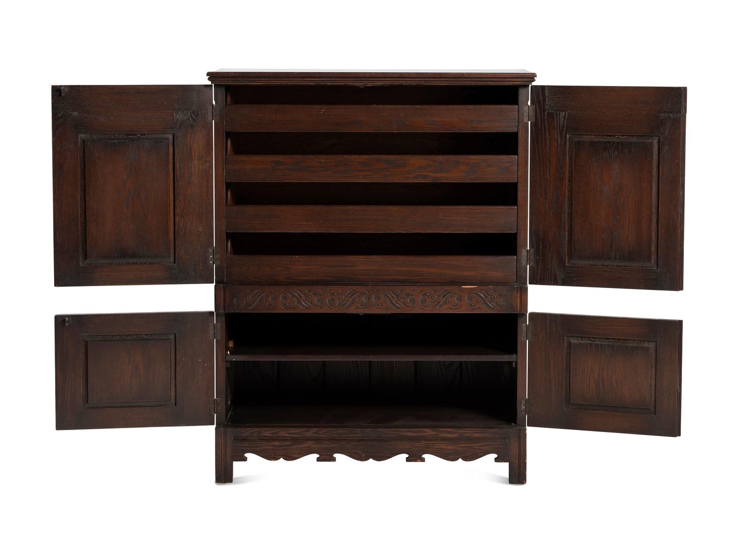 A Jacobean Style Carved Oak Cabinet
