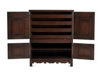 A Jacobean Style Carved Oak Cabinet