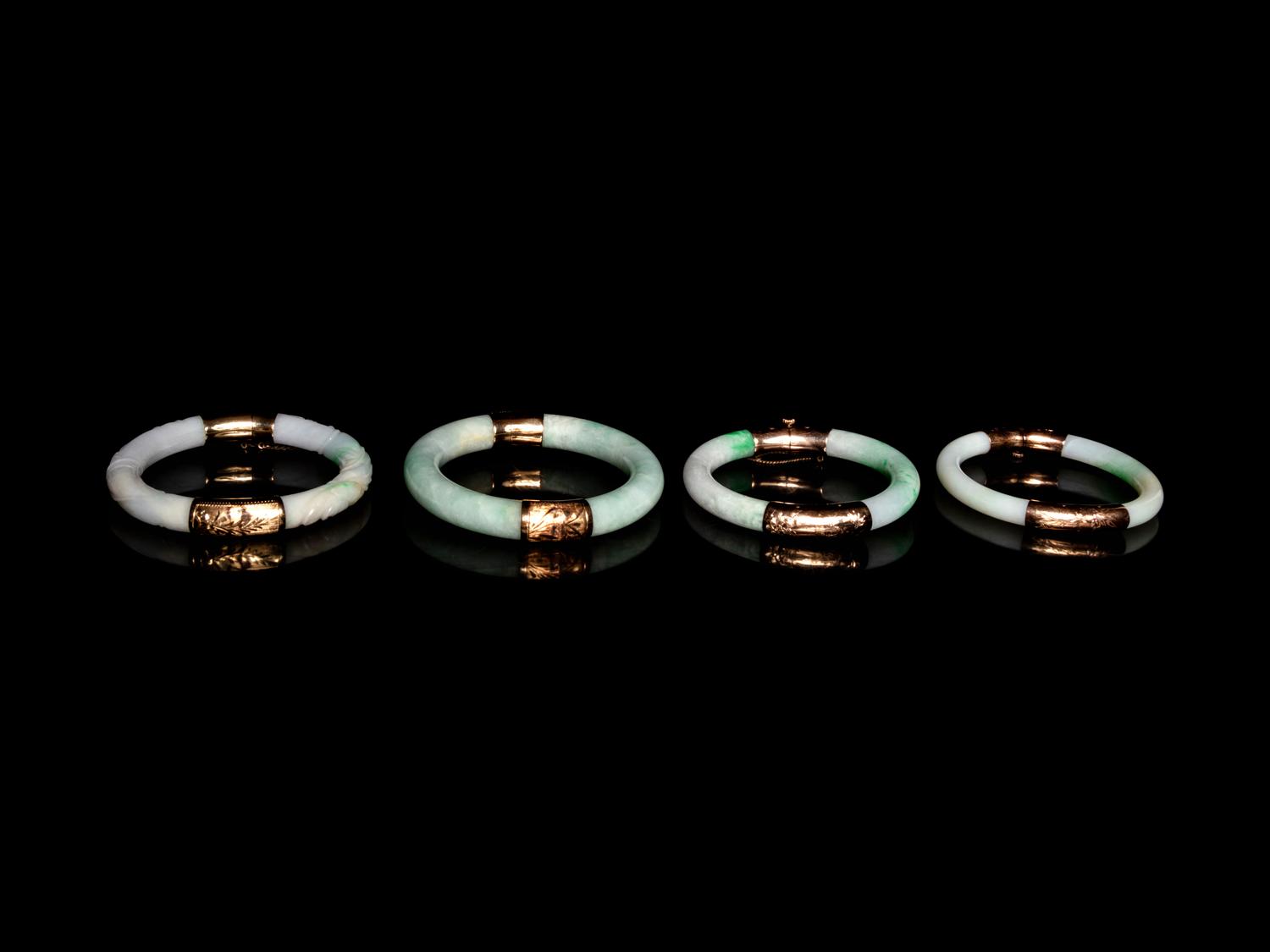 Four Chinese Metal Mounted Jadeite Bangles