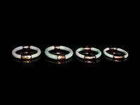 Four Chinese Metal Mounted Jadeite Bangles