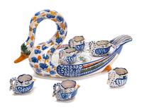 A Quimper Pottery Swan Form Demitasse Set Height of swan 8 inches.