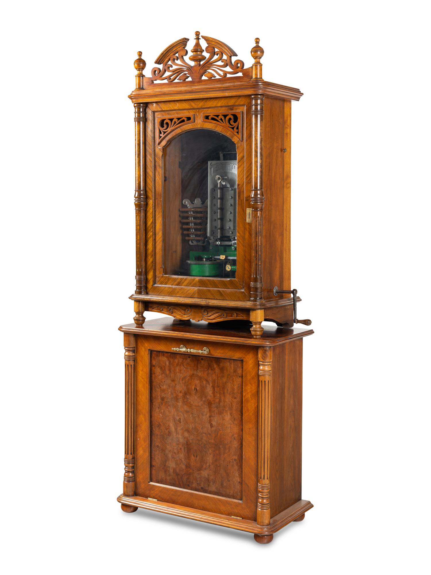 A 24-Inch Lochmann's Original Disc Music Box with Tubular Bells and Base Cabinet
