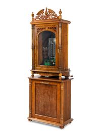 A 24-Inch Lochmann's Original Disc Music Box with Tubular Bells and Base Cabinet