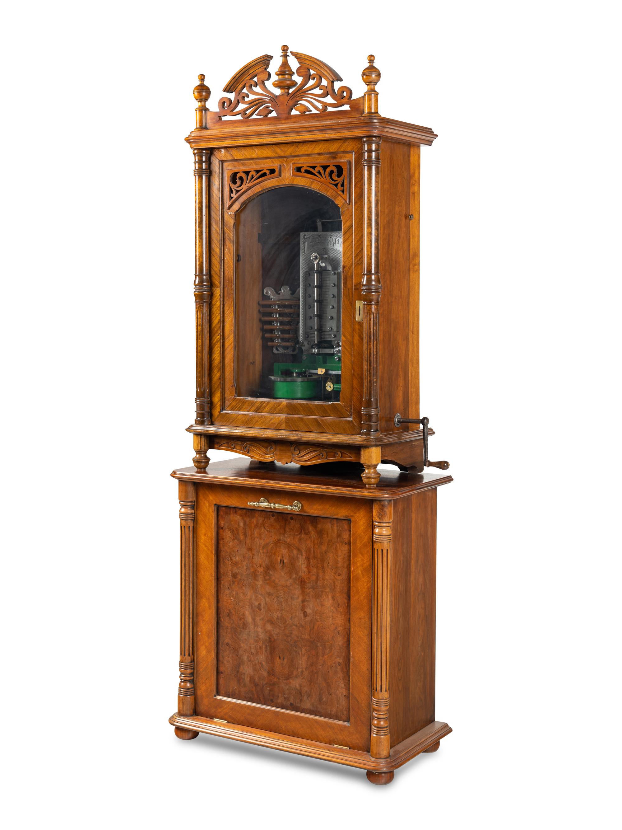 A 24-Inch Lochmann's Original Disc Music Box with Tubular Bells and Base Cabinet