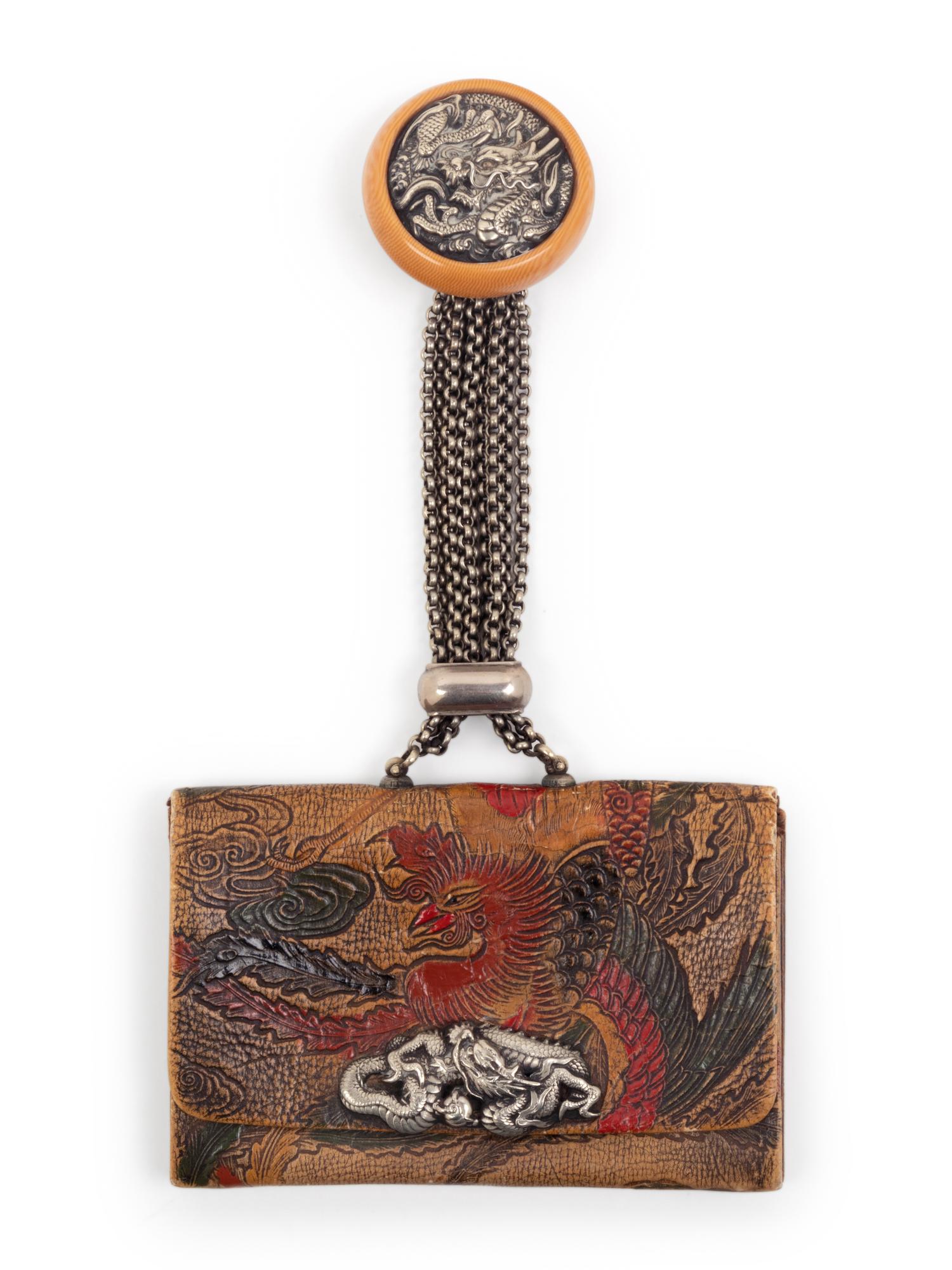 A Leather Purse and A Fabric Fan