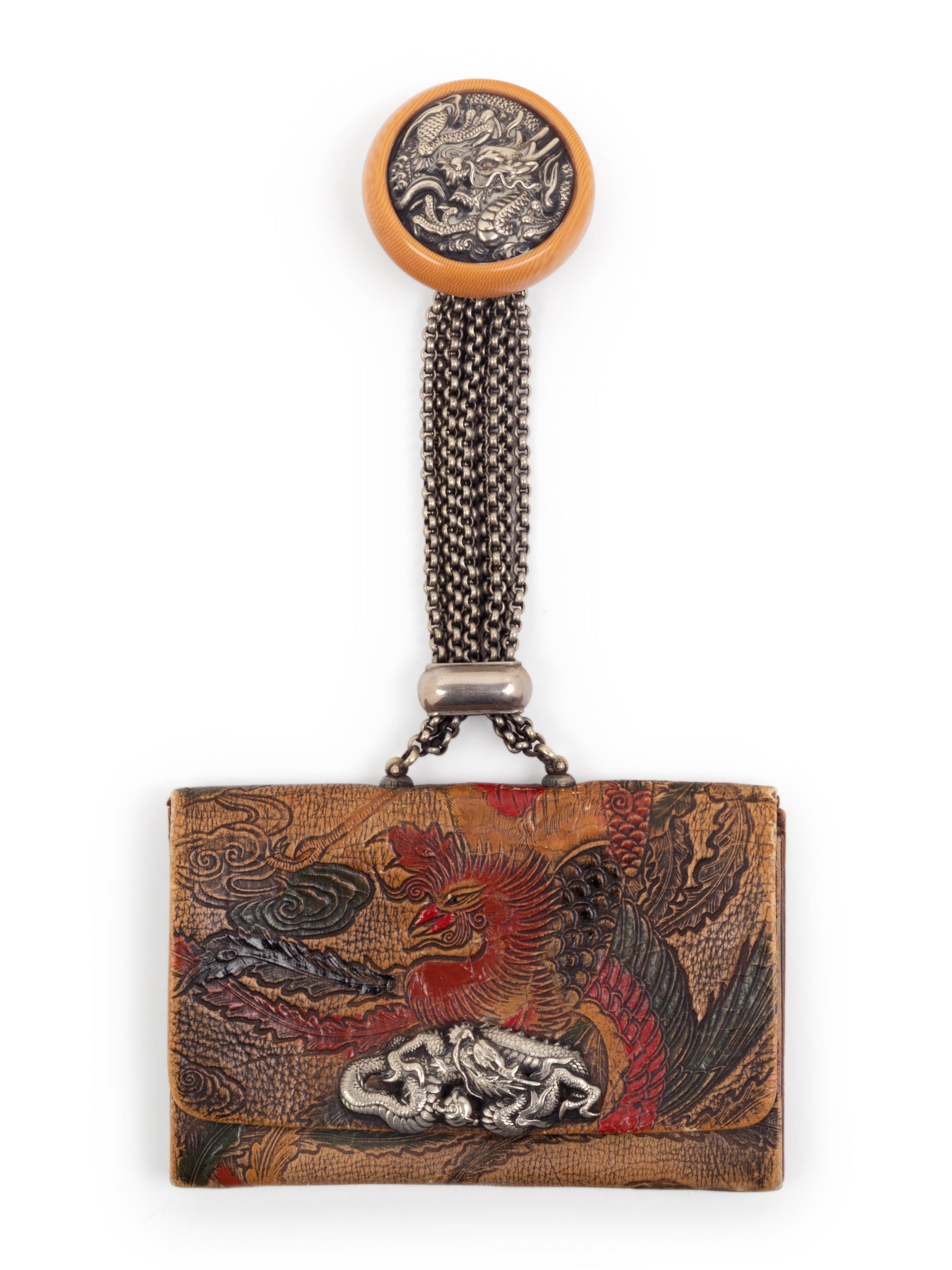 A Leather Purse and A Fabric Fan