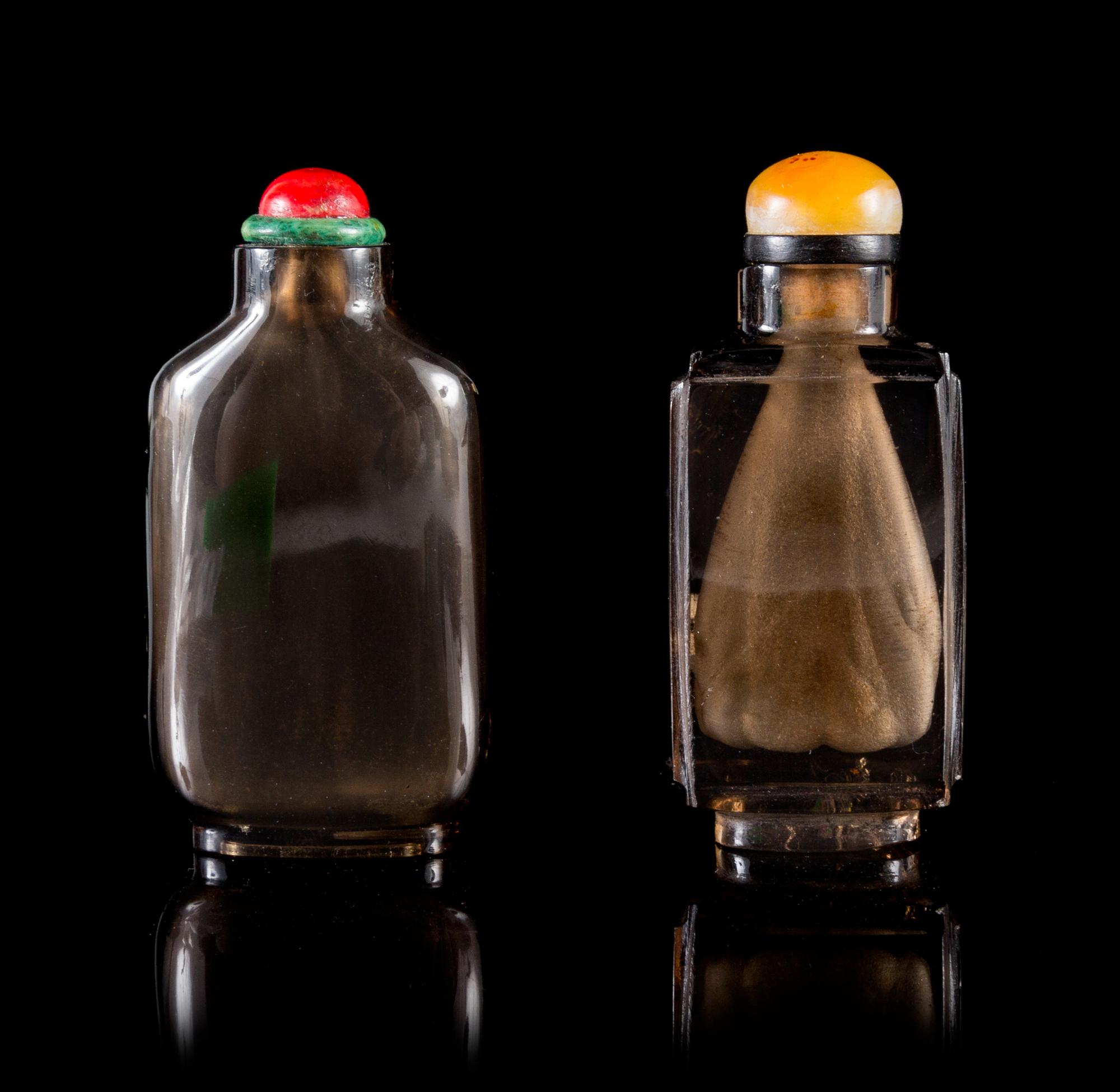Two Lead Glass Snuff Bottles Height of each 2 3/4 inches.