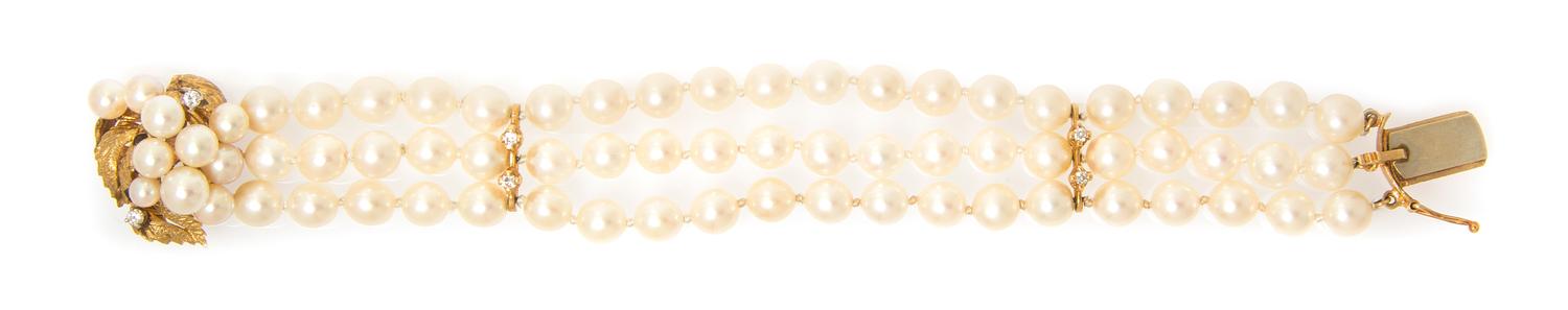 A 14 Karat Yellow Gold, Cultured Pearl and Diamond Multi Strand Bracelet, 21.60 dwts.