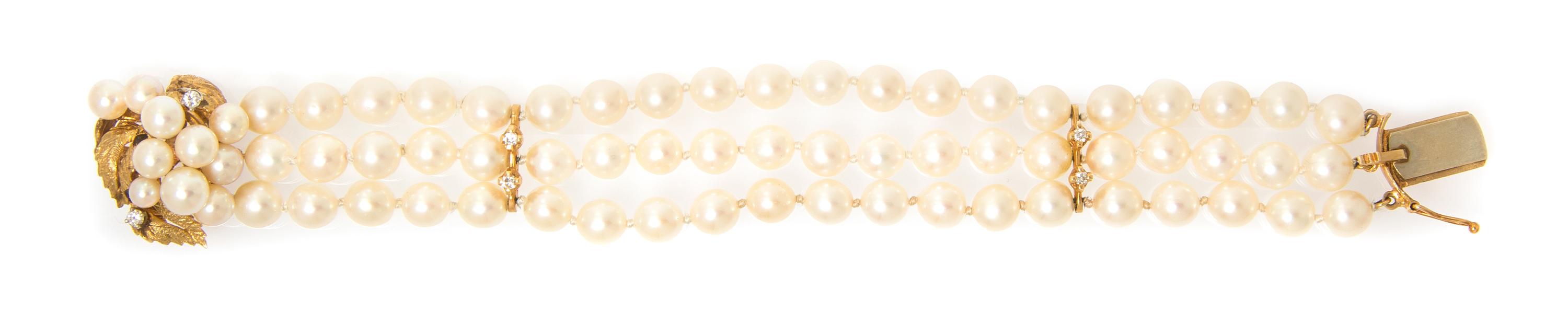 A 14 Karat Yellow Gold, Cultured Pearl and Diamond Multi Strand Bracelet, 21.60 dwts.