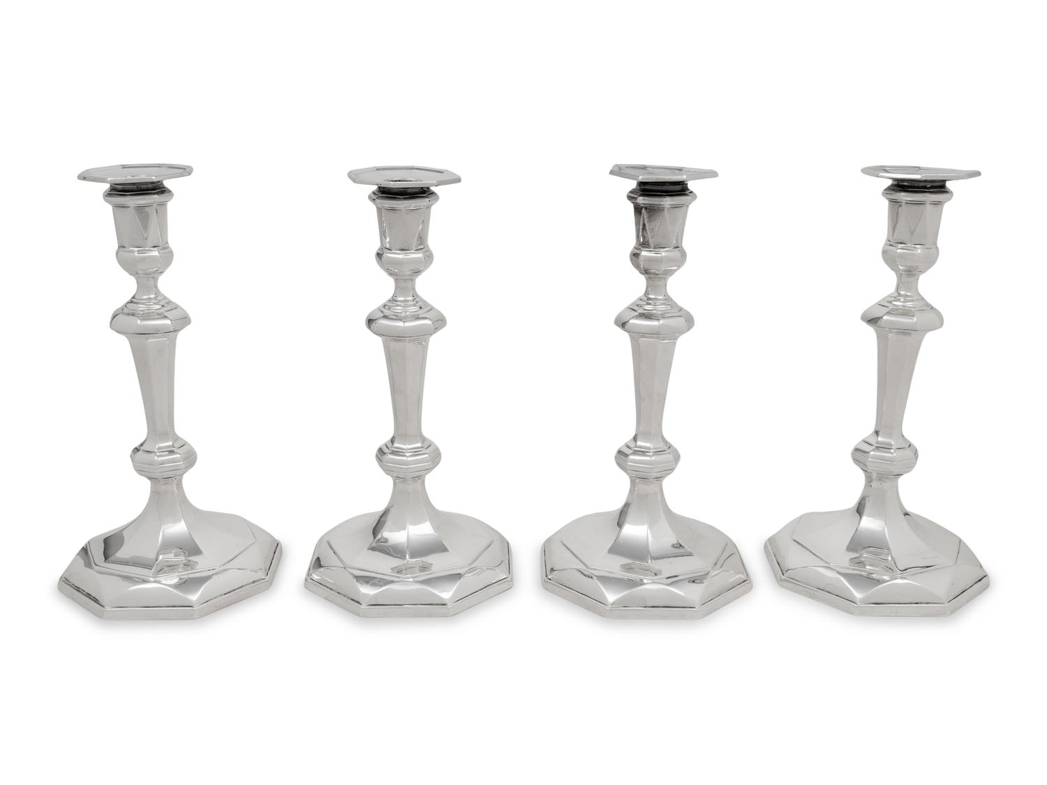 A Set of Four English Britannia Silver Candlesticks