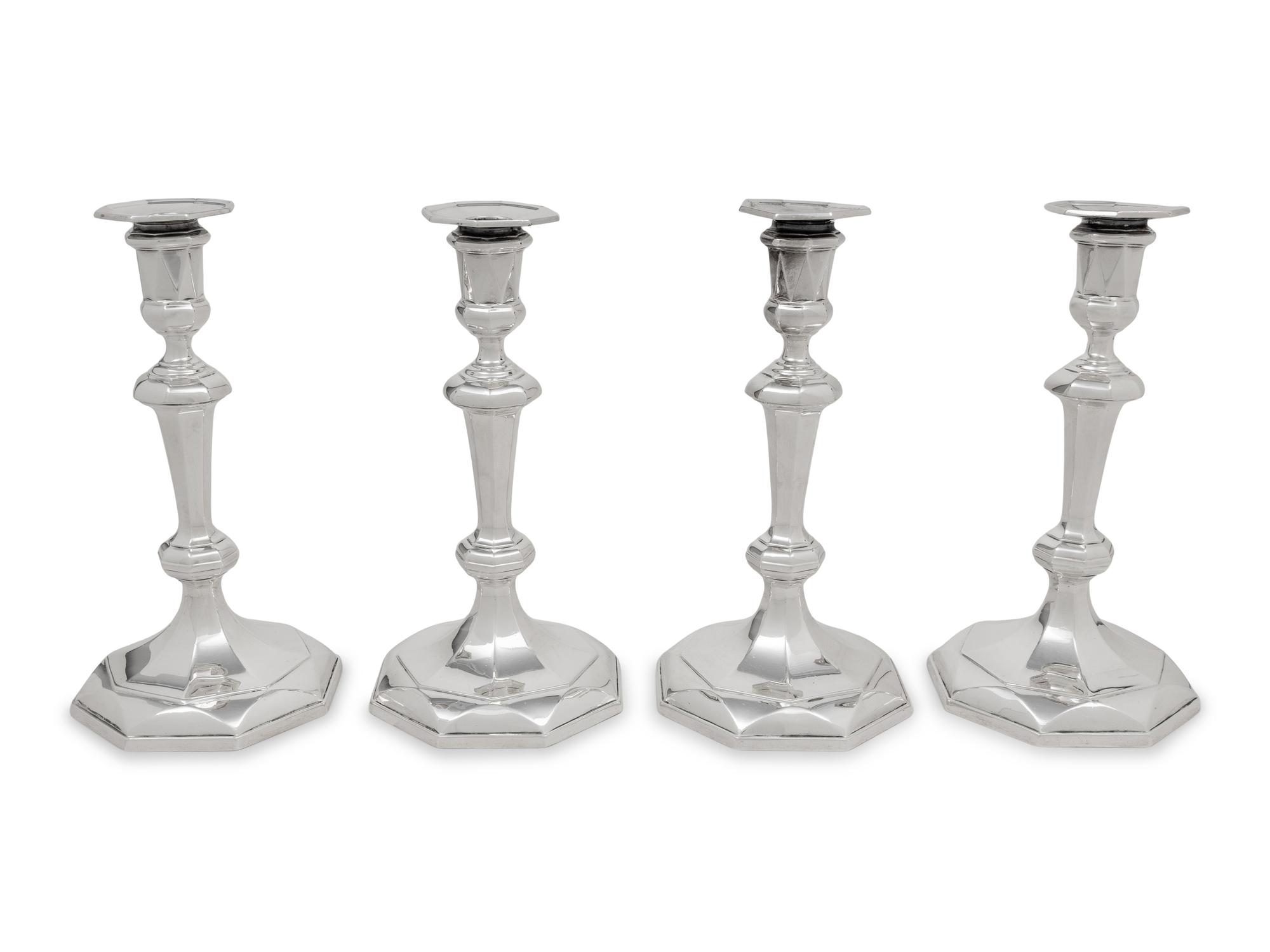 A Set of Four English Britannia Silver Candlesticks