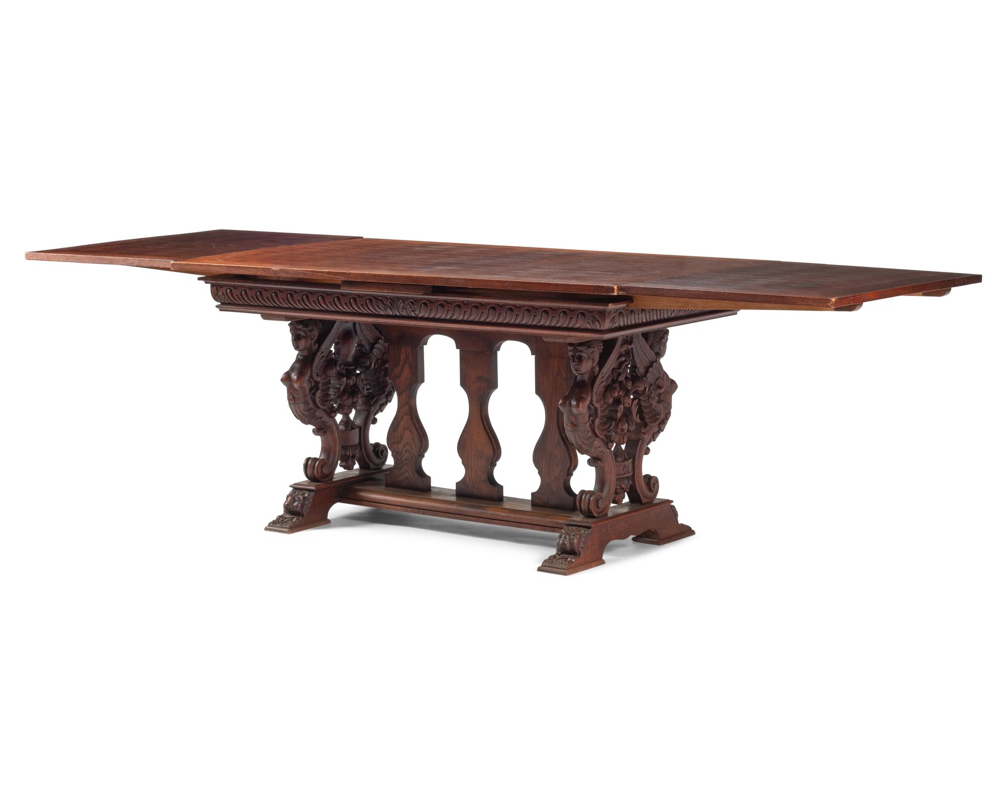 An Italian Renaissance Revival Draw-Leaf Dining Table