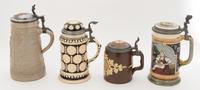 A Group of Four German Steins Height of tallest 10 inches.