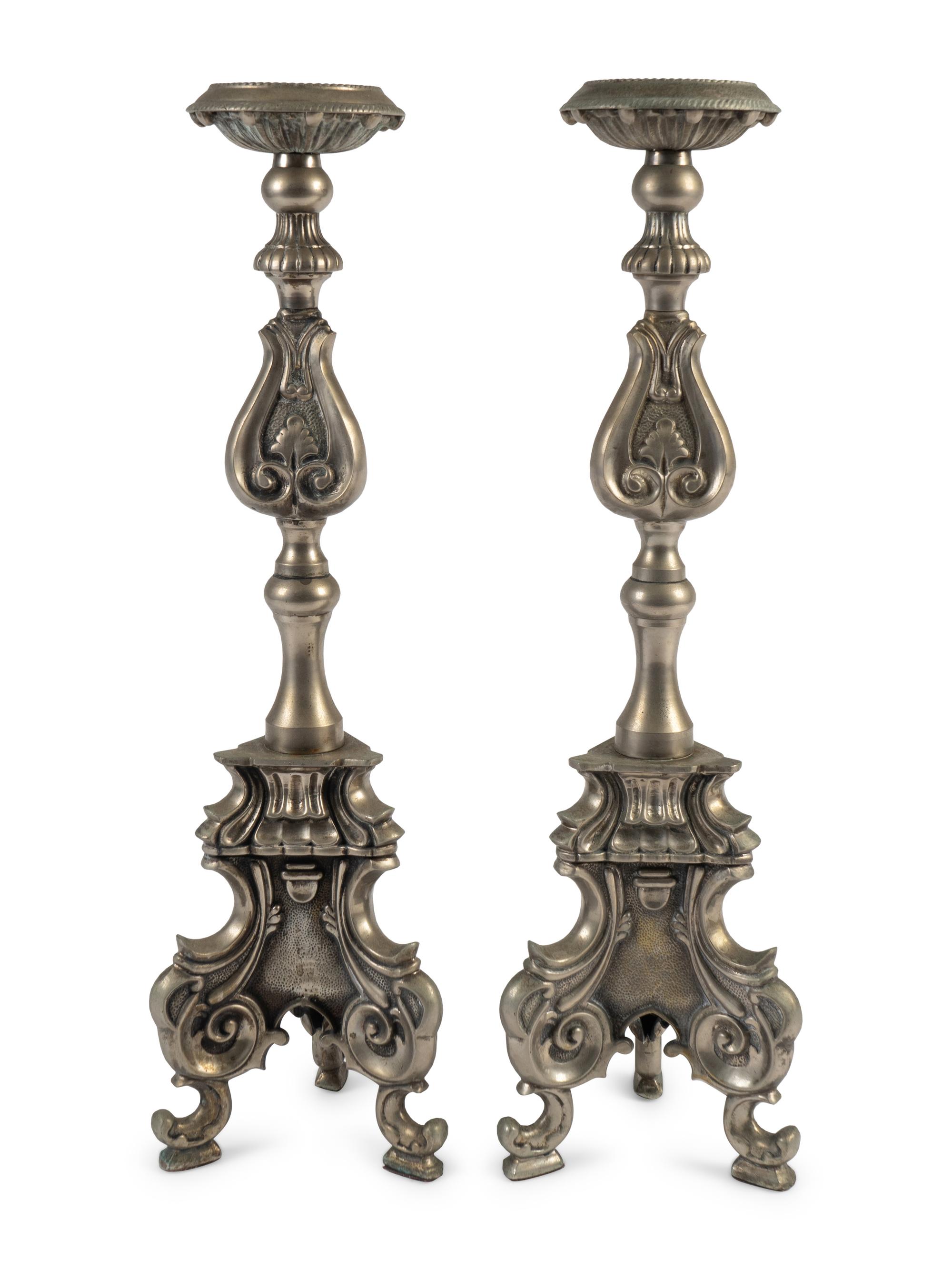 A Pair of Italian Renaissance Style Silvered Brass Pricketsticks