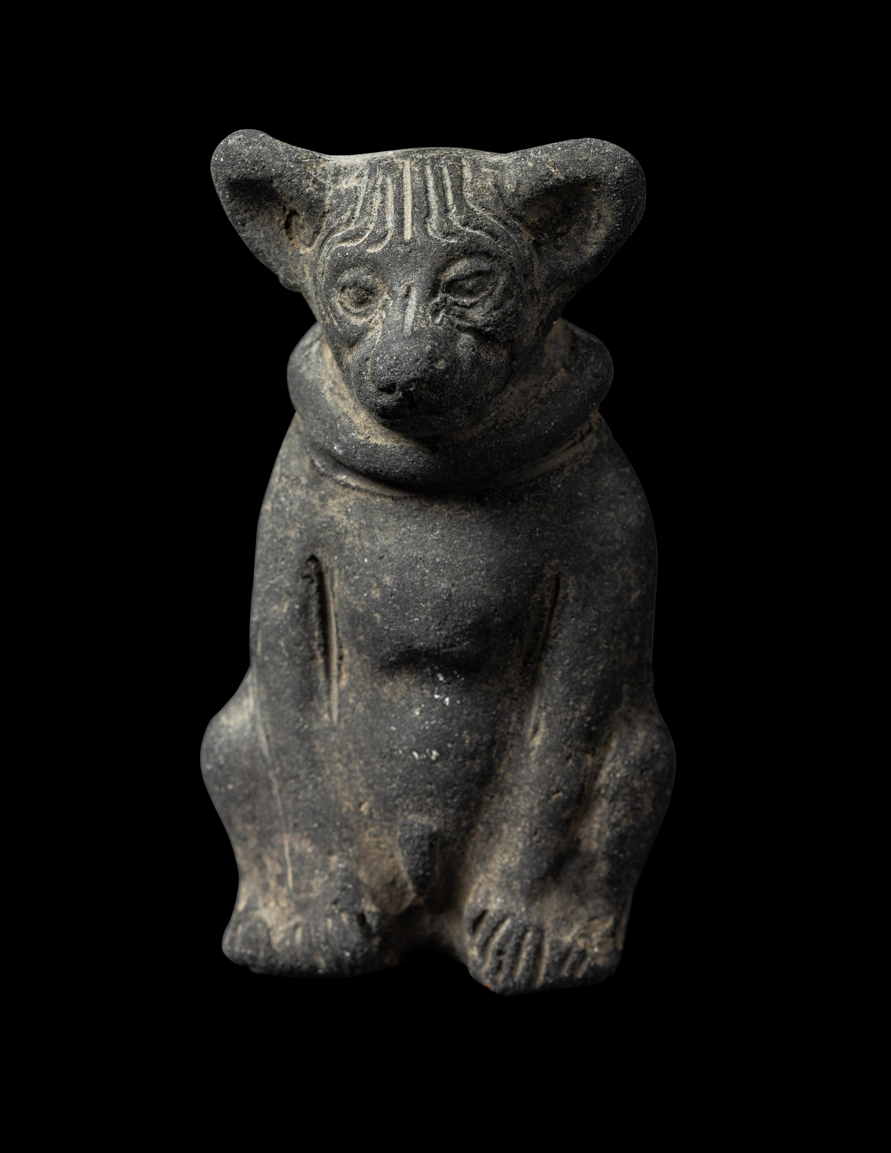 A Maya Ocharina (Whistle) in the Form of a Seated Dog