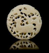 A Pierce Carved Jade Pendant Diameter 2 1/8 inches.
