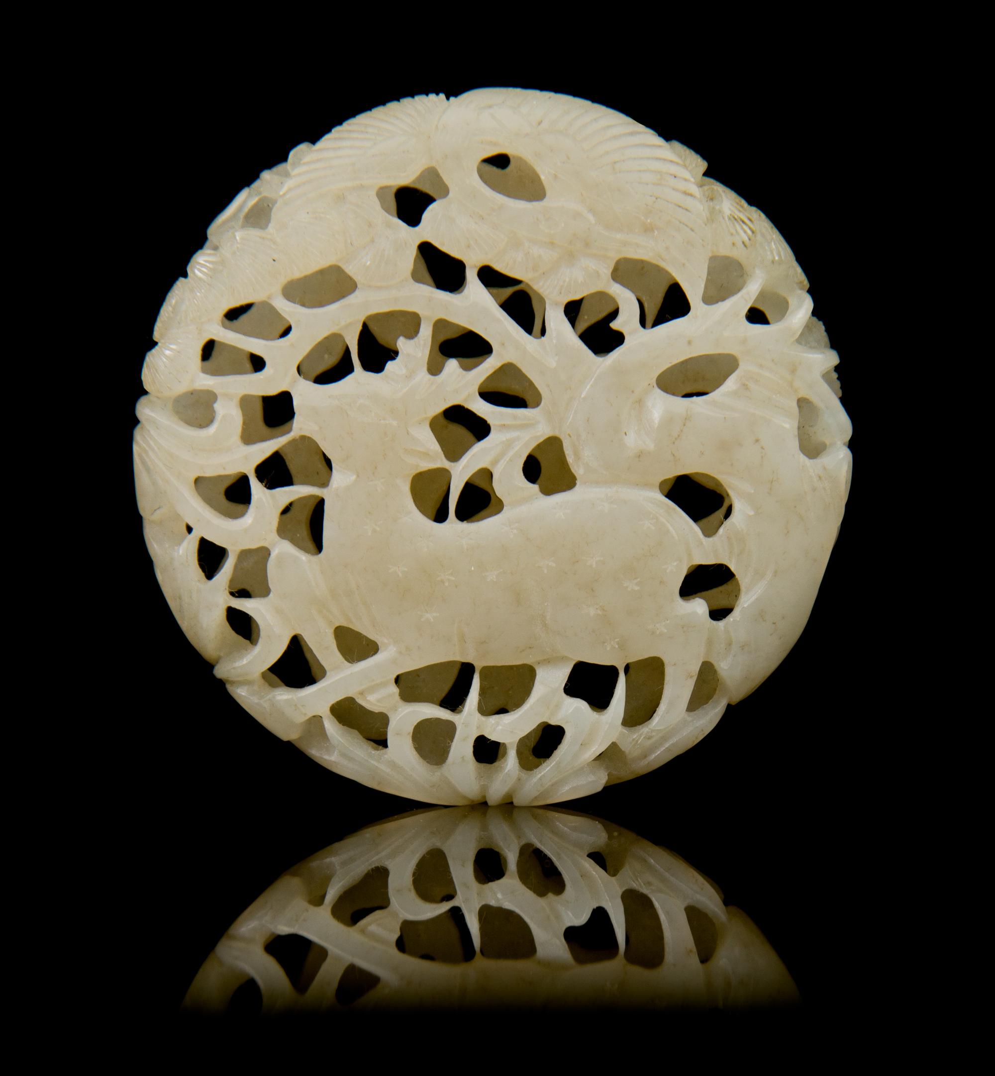 A Pierce Carved Jade Pendant Diameter 2 1/8 inches.