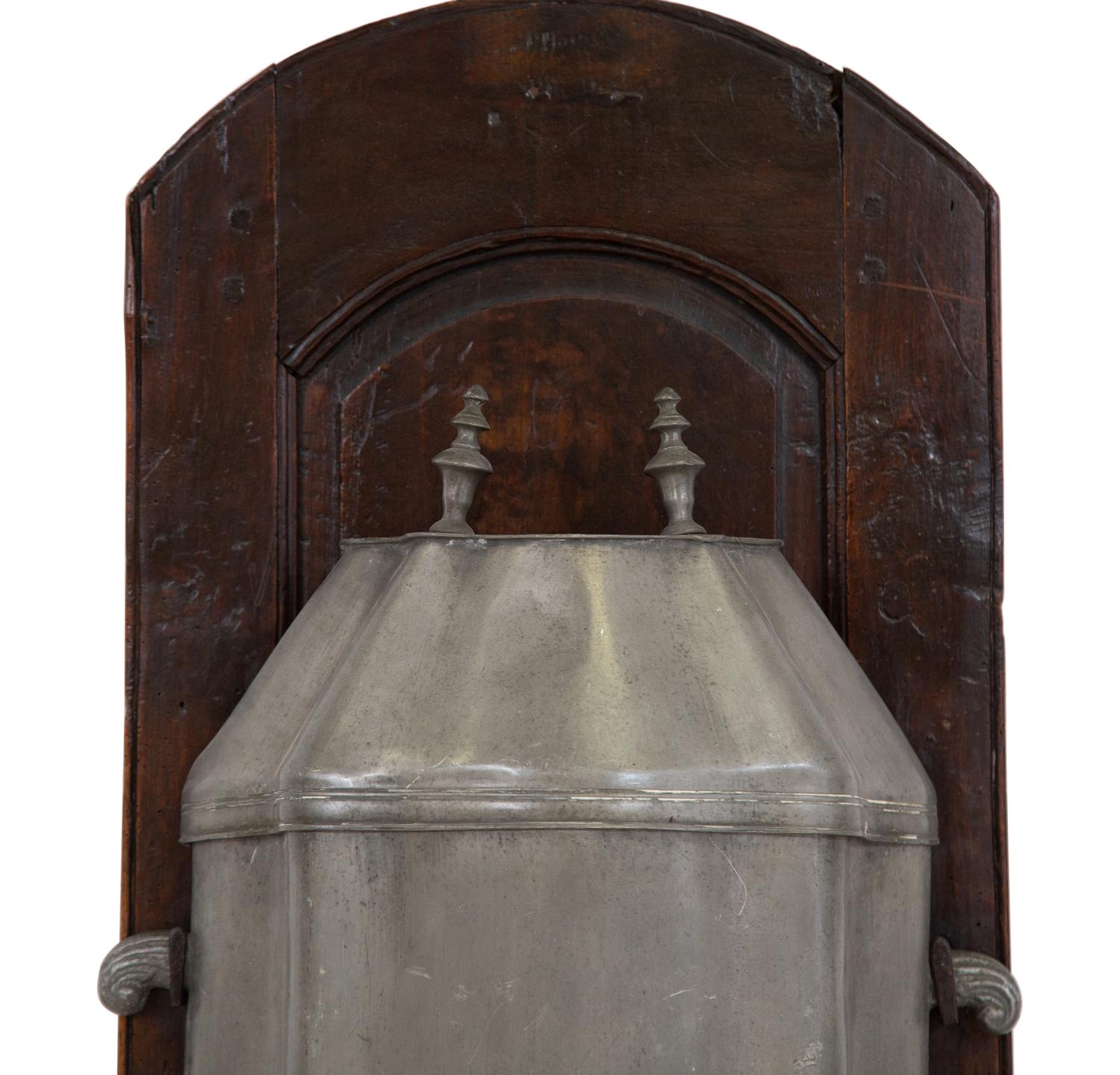 An Italian Carved Walnut Lavabo with Pewter Cistern and Basin