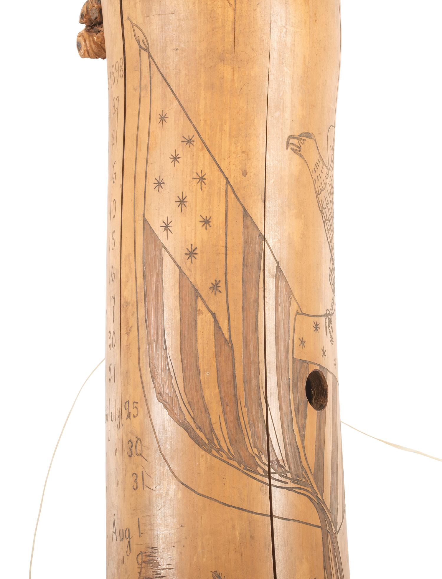 [SPANISH AMERICAN WAR]. Spanish American War-period bamboo canteen with folk art decoration. Ca late 19th century.
