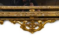 An Italian Baroque Style Giltwood Mirror