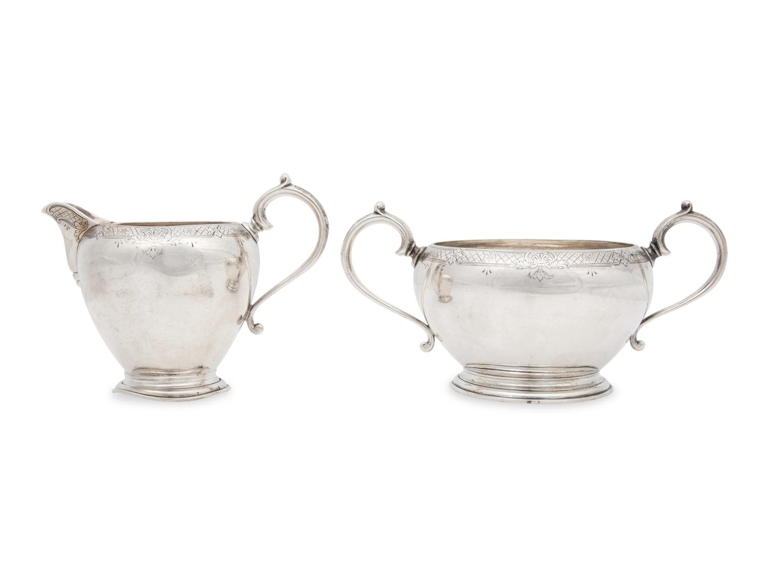 An English Silver Creamer and Sugar