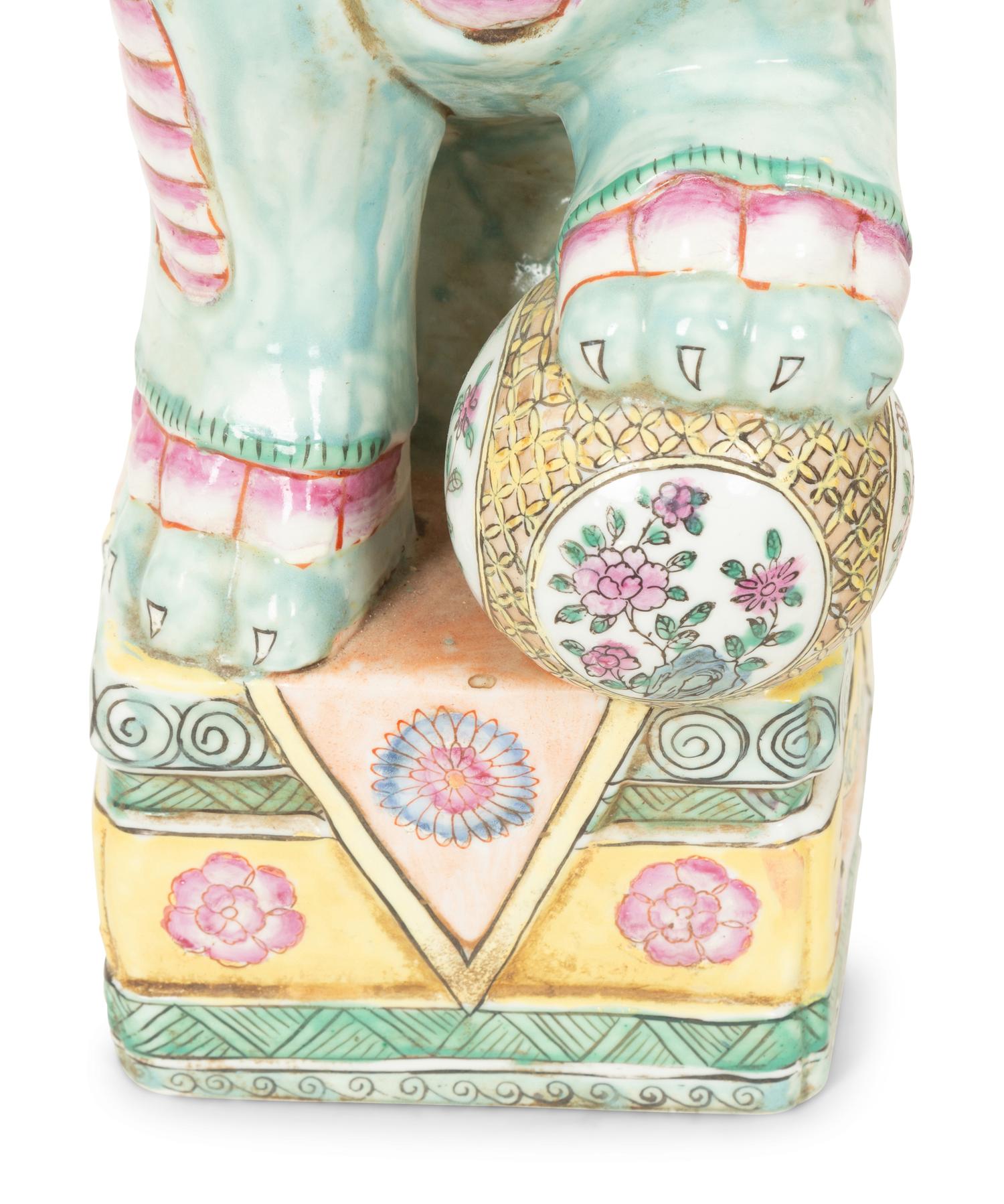 A Pair of Chinese Glazed Ceramic Seated Foo Lions