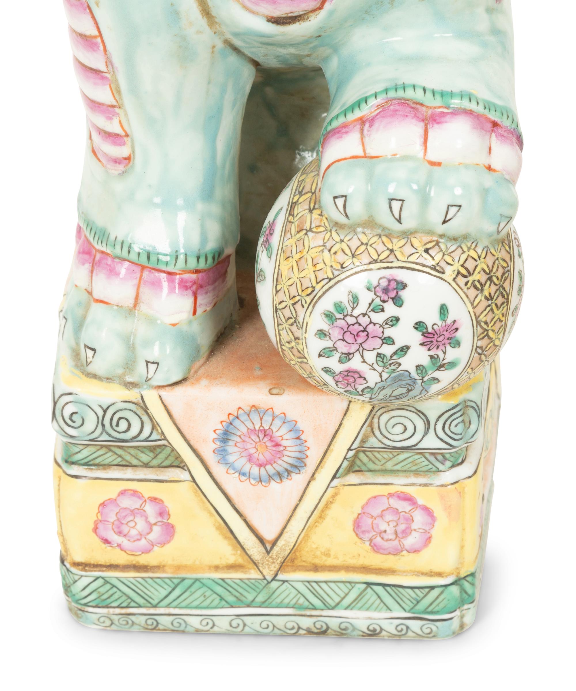 A Pair of Chinese Glazed Ceramic Seated Foo Lions