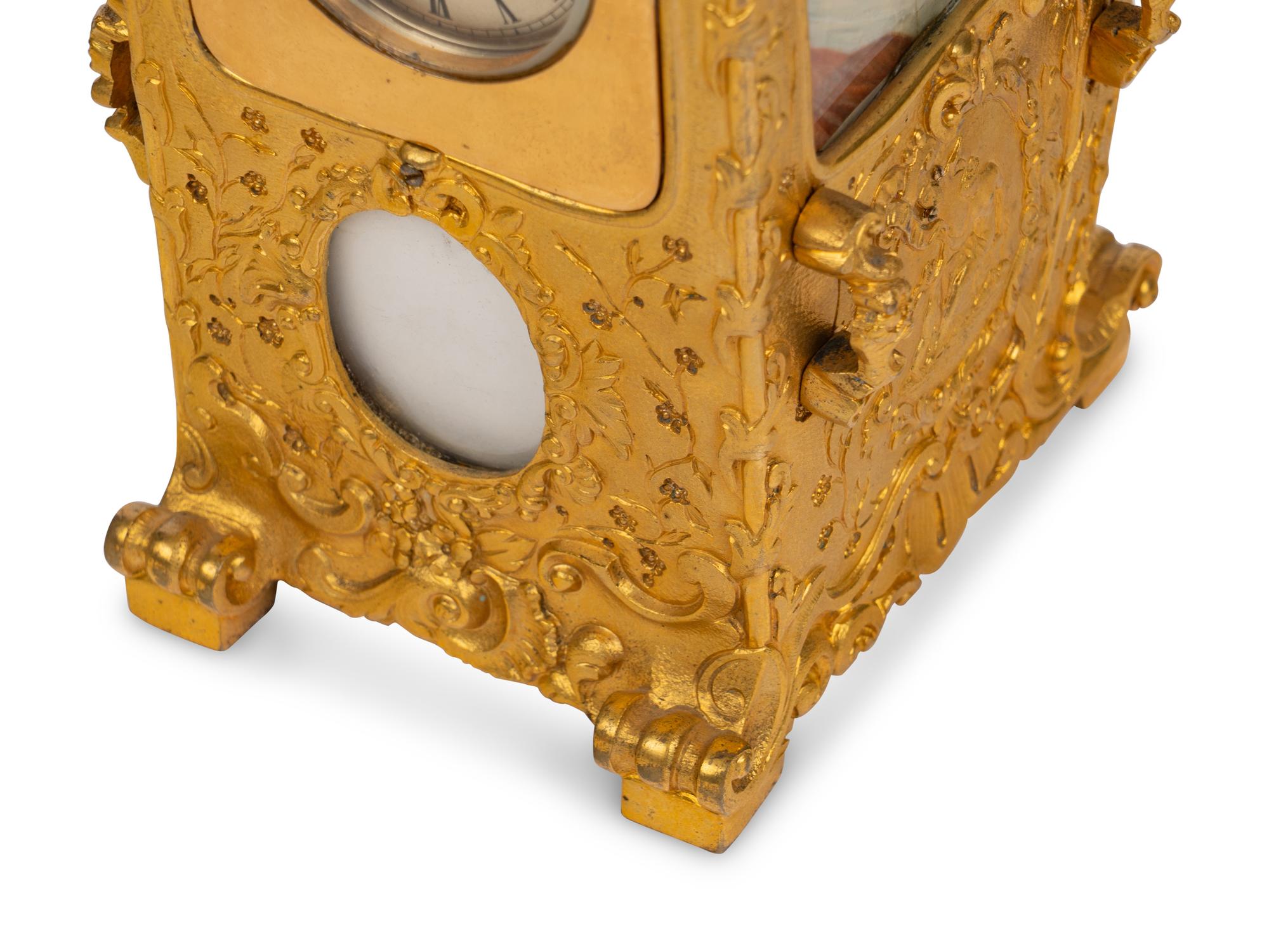 A French Gilt-Bronze Hour Repeater Carriage Clock in the Form of a Sedan Chair