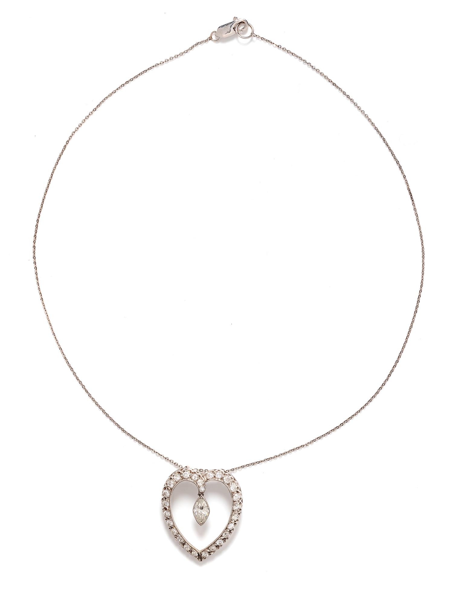 A White Gold and Diamond Heart Pendant/Necklace,