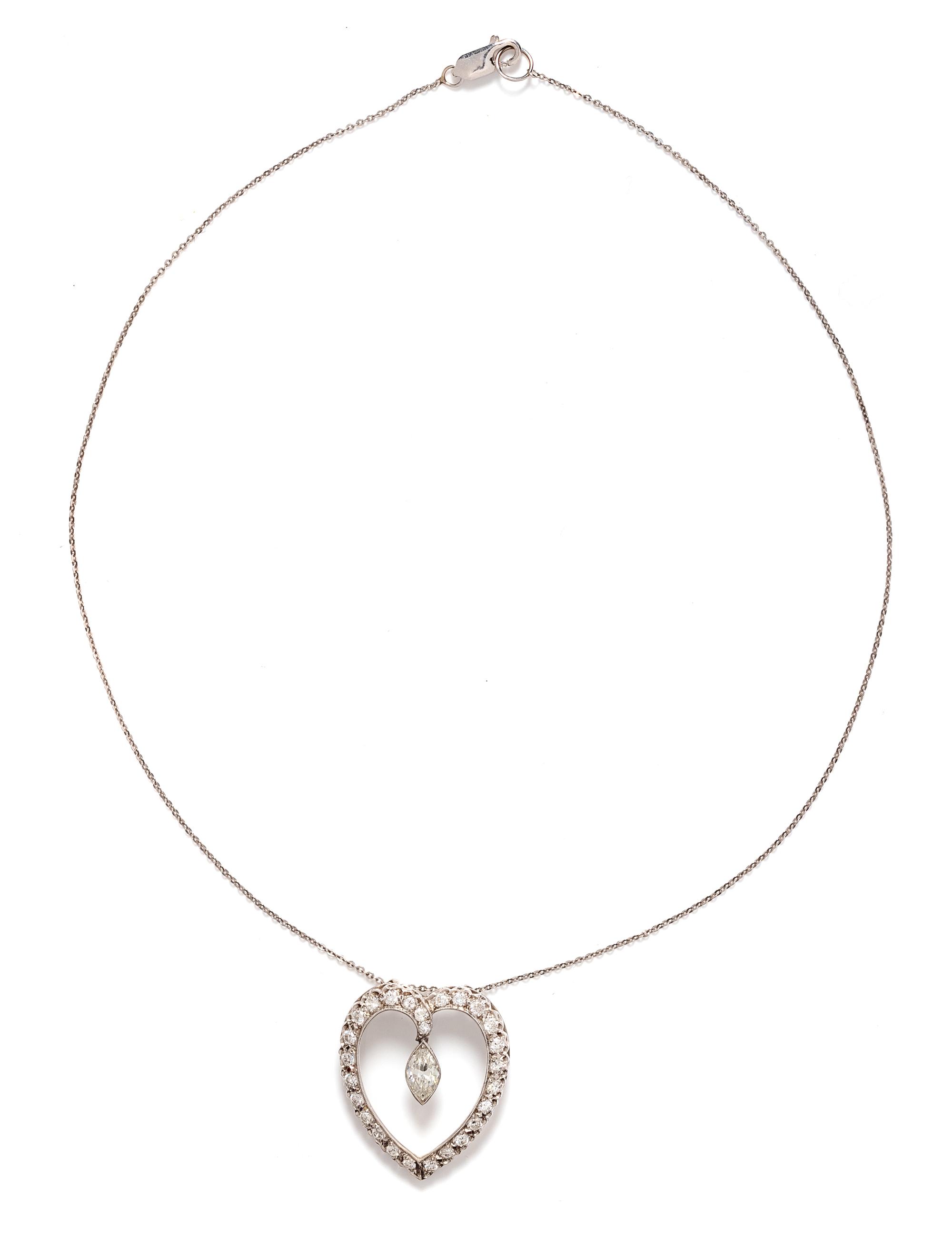 A White Gold and Diamond Heart Pendant/Necklace,