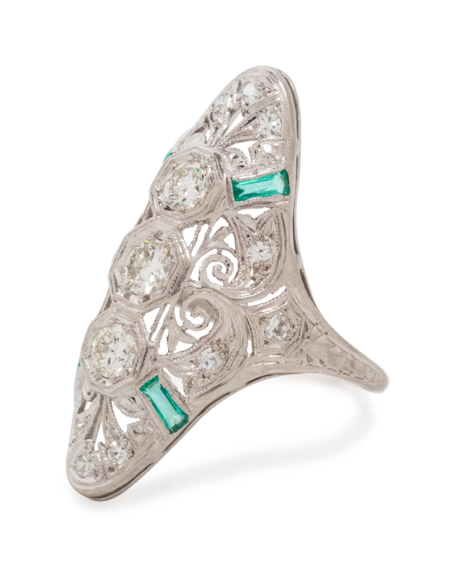 A Platinum, Diamond and Emerald Ring,
