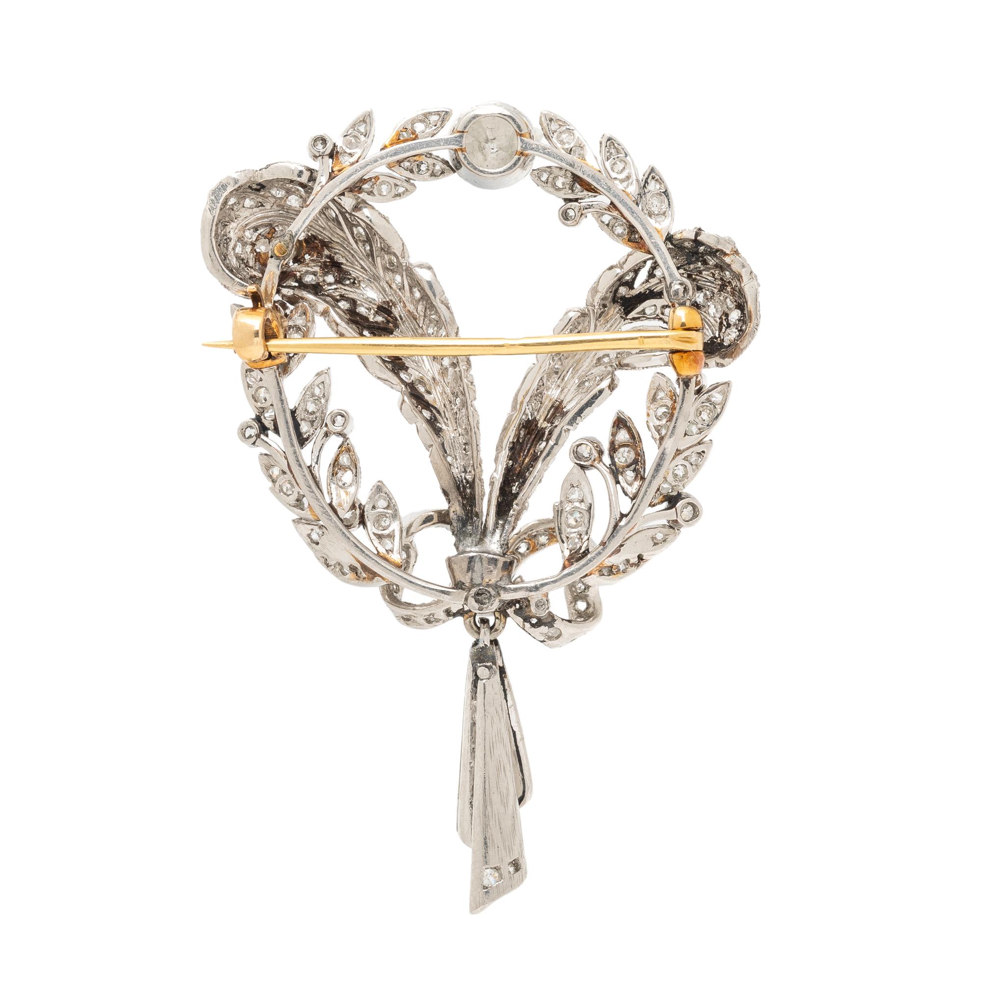 EDWARDIAN, PLATINUM AND DIAMOND FEATHER BROOCH