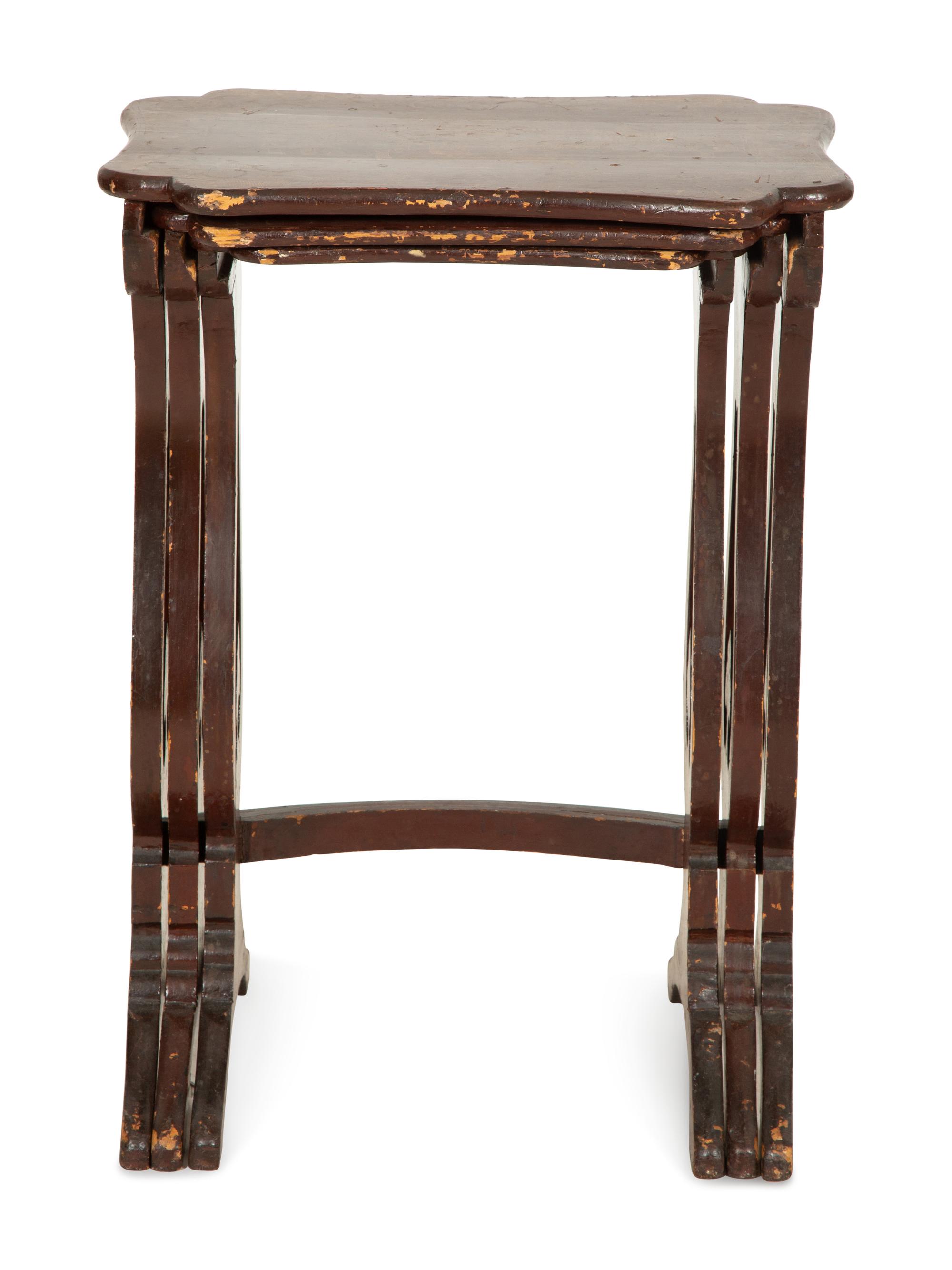A Set of Three Chinese Export Quartetto Tables in Red and Gilt Lacquer